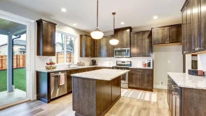 kitchen remodel work green bay wi Brightly lit remodeled kitchen with wooden cupboards and island in Green Bay, WI
